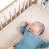 baby sleeping in cot