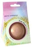 Bath bomb packaging with a pink bath bomb and colorful packaging on a white background