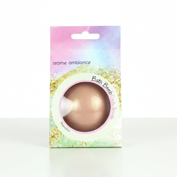 Bath bomb packaging with a pink and gold bath bomb on a white background