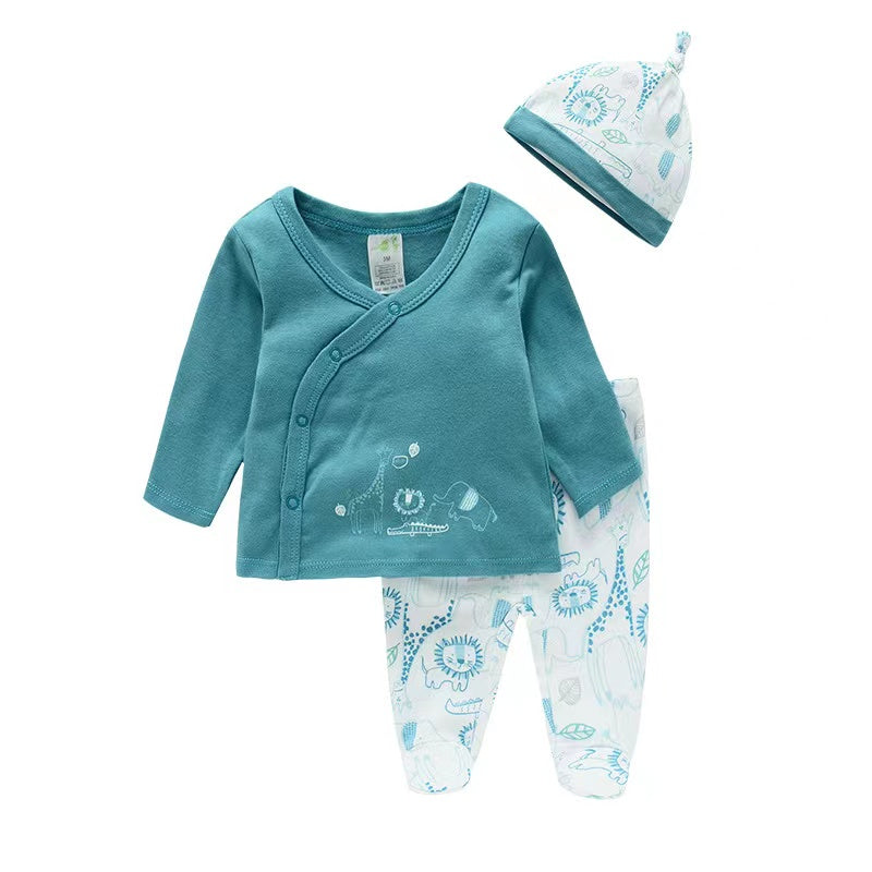 Baby outfit set with teal cardigan, white pants, and hat on a white background