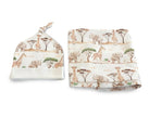Baby hat and blanket set with safari animal pattern on a white background