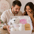 Baby Girl Gender Reveal Gift Hamper with white 'It's a Girl' teddy bear and pink Hello World onesie from The Baby Gift Company