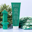 MooGoo Baby Scalp Repair Cream | green tub and toys