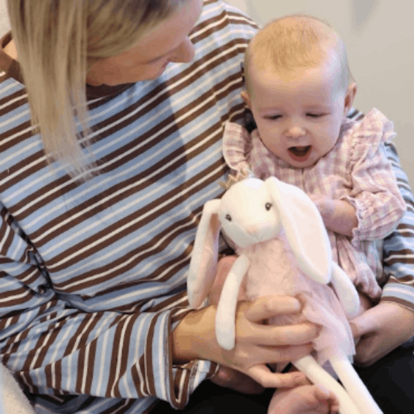 Mother and baby holding Ballerina Bunny toy