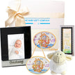 Baby gift set with photo frame, wall plaque, and plush toy from The Baby Gift Company.