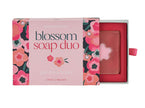 Blossom soap duo packaging with floral design on a white background