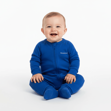 Baby sitting in Bonds Zip Wondersuit