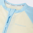 Ivory and light blue newborn baby sleepsuit with zipper