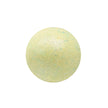 Green bath bomb on a white background
