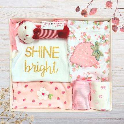 Baby gift set with 'SHINE bright' shirt, floral baby girl clothes , and strawberry pants for baby in a gift box.