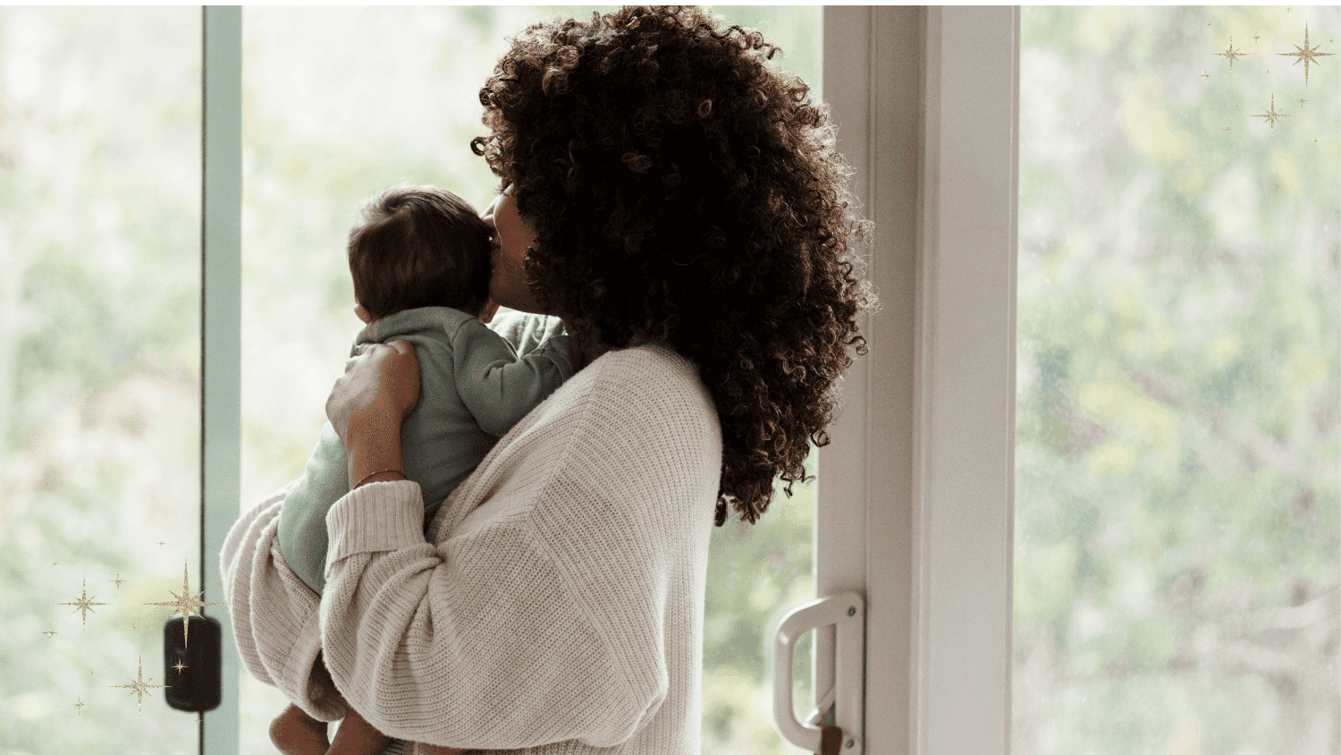 new mother and baby near window