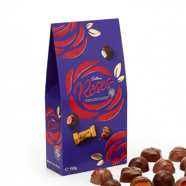 Cadbury Roses chocolate box with purple and gold design on a white background