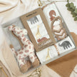 Bamboo Wash Cloths by Bubba Blue  with a giraffe toy on a fabric background