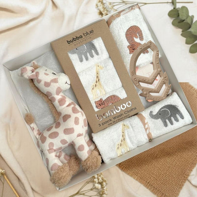 Bamboo Wash Cloths by Bubba Blue  with a giraffe toy on a fabric background