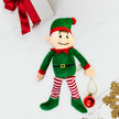 Christmas elf toy on a white background