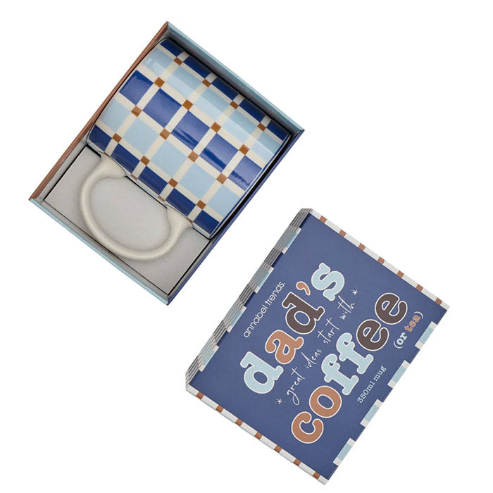 Checkered mug in a box with 'dad's Coffee' packaging on a white background