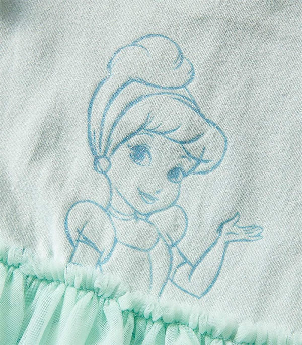Embroidered design of a princess on a light blue fabric background