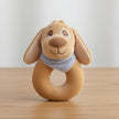 Dog ring rattle toy on wood table