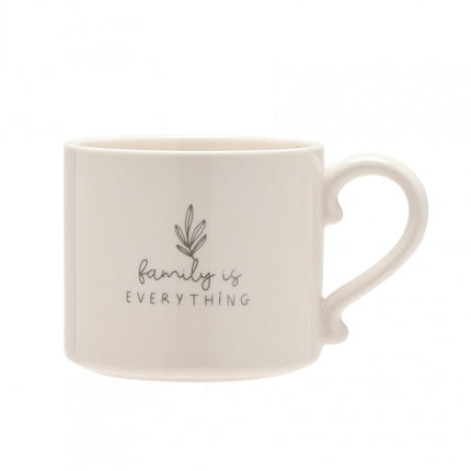 White family if everything mug on a white background.