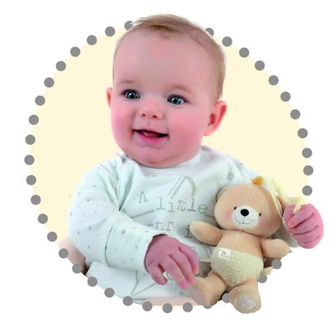 First Forever Friends Bear Baby holding a teddy bear with a polka dot border