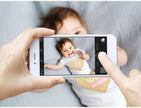Person taking a photo of a baby with a smartphone