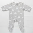 Gray baby onesie with white cloud pattern on a white background