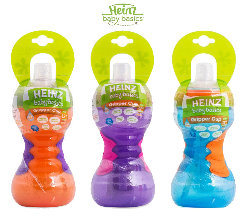 Three Heinz baby basics gripper cups with colorful designs on a white background.