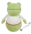 Green frog plush toy with a white shirt on a white background