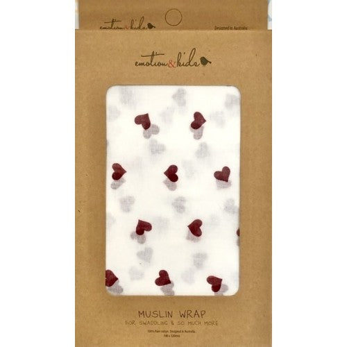 Muslin wrap with red hearts in a brown packaging box, featuring the brand 'emotion & kinda'.