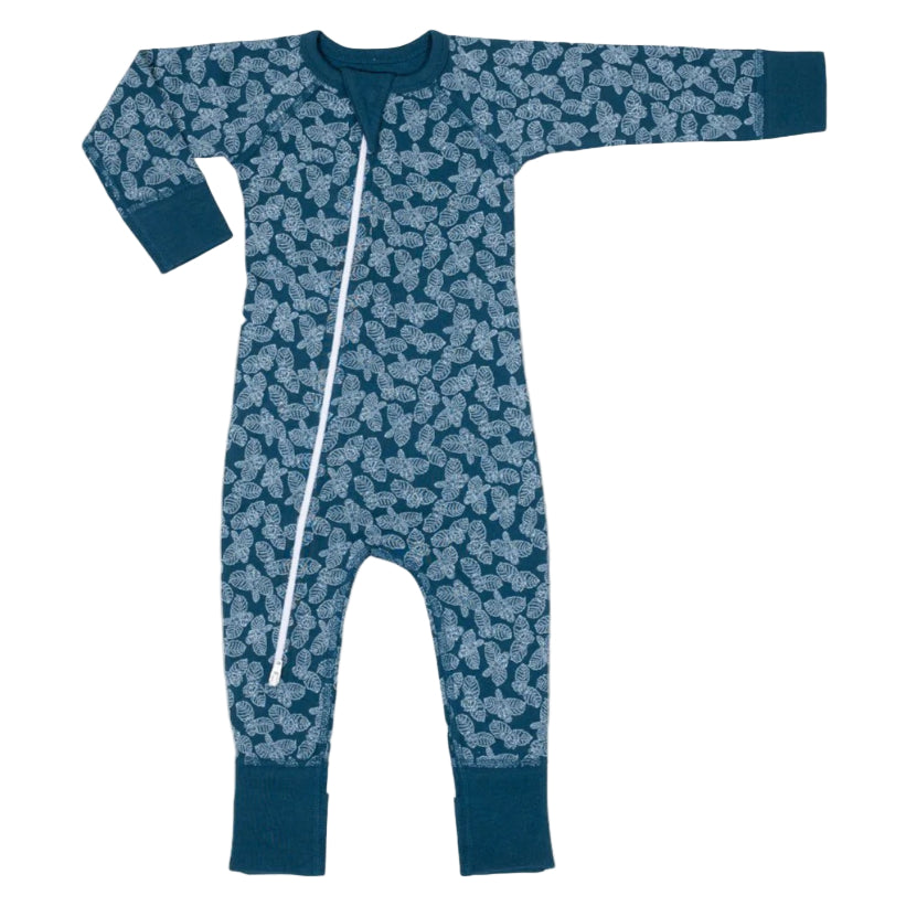 Blue baby onesie with white pattern on a white background, featuring an organic cotton label.