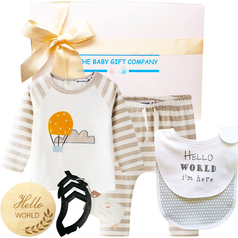 Baby gift set with onesie, bib, and booties from The Baby Gift Company.