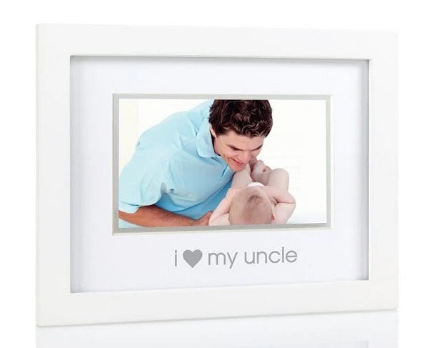 White photo frame with a picture of a man and child, text 'i ❤️ my uncle' on a white background