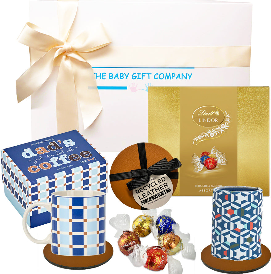 Gift set with a mug, cookies, and a box of coffee, branded by The Baby Gift Company.