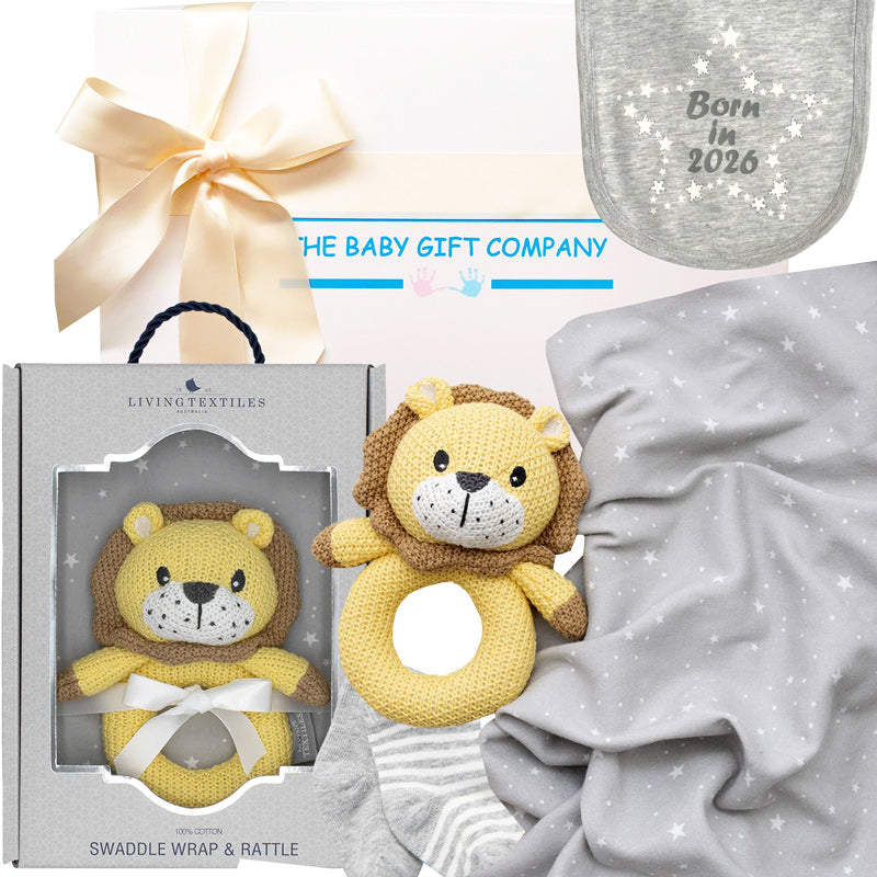Baby gift set with lion-themed swaddle wrap and rattle, baby blanket, and bib with 'Born in 2025' text.