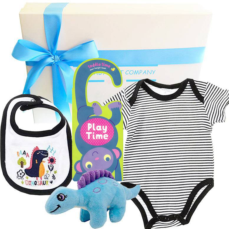 Baby gift set with onesie, bib, and toy on a white background