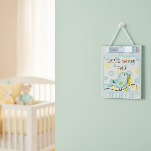 Love never fails wall plaque in nursery 