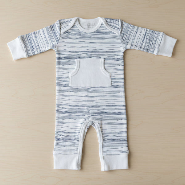 Striped baby romper with a pocket on a white background