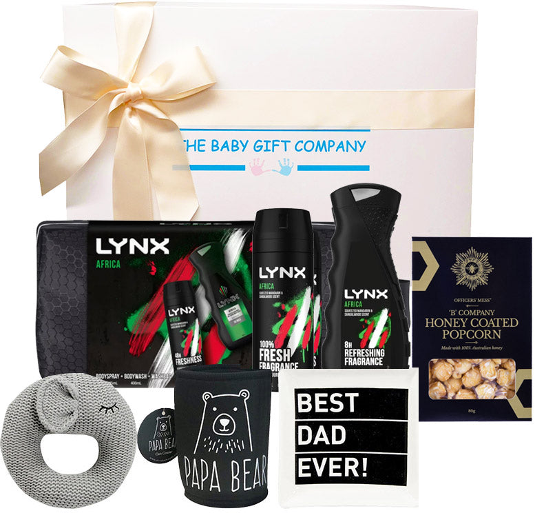 New Dad Gift set with Lynx products, a rattle toy, and a box of gourmet popcorn from The Baby Gift Company.