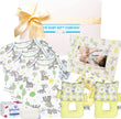Baby gift set with baby clothes, toys, and photo frame from The Baby Gift Company.