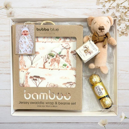 Baby gift set with swaddle wrap, teddy bear, and card in a box, featuring the brand 'bubba blue'.