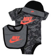 Baby outfit set with camouflage pattern and Nike logo on a white background