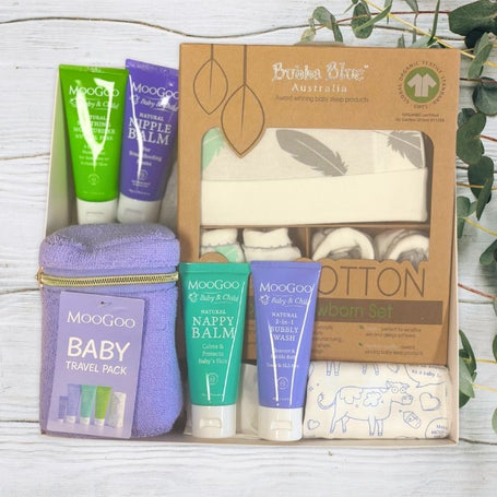 Bamboo by Bubba Blue 3-piece newborn set with baby products on a wooden surface.