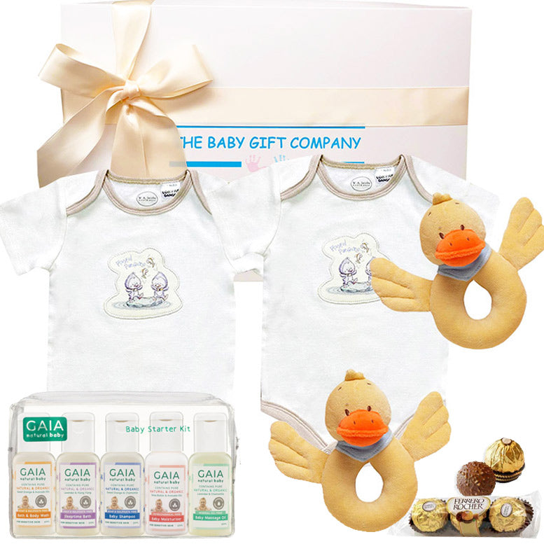 baby gift set with baby clothes and duck toys