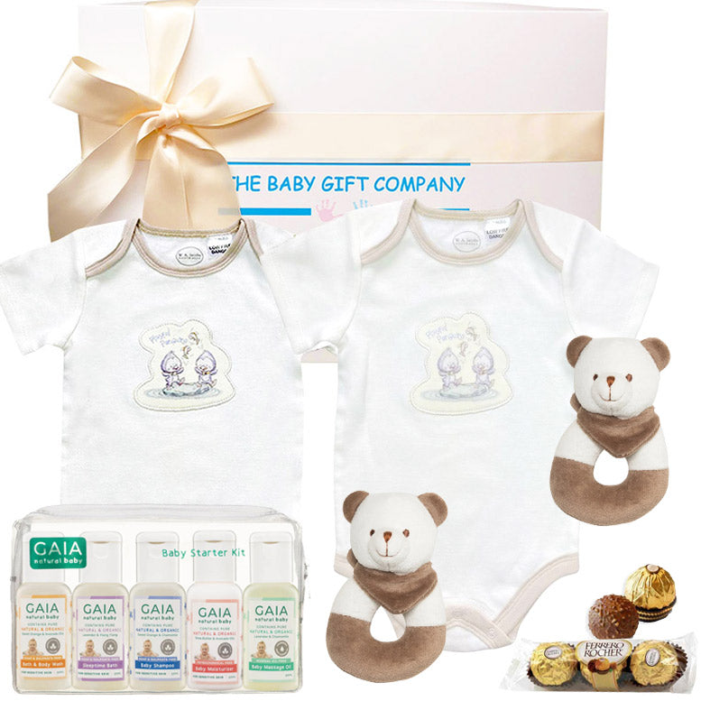 baby gift set with organic baby clothes, natural gaia baby skincare and bear rattle toys
