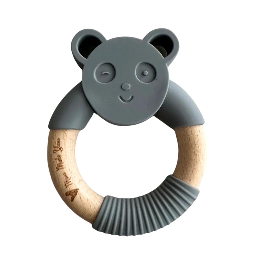 Teething ring with panda design on a white background
