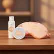 Pamper set of bubble bath, 50ml body butter, and peach sleep mask on a table