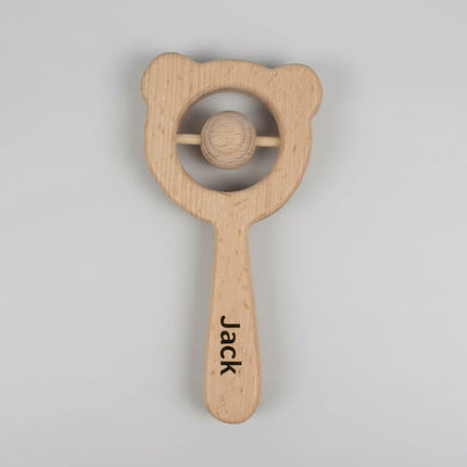 Personalised Wooden Teddy Rattle on grey background