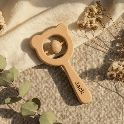 Personalised Wooden Teddy Rattle on natural background
