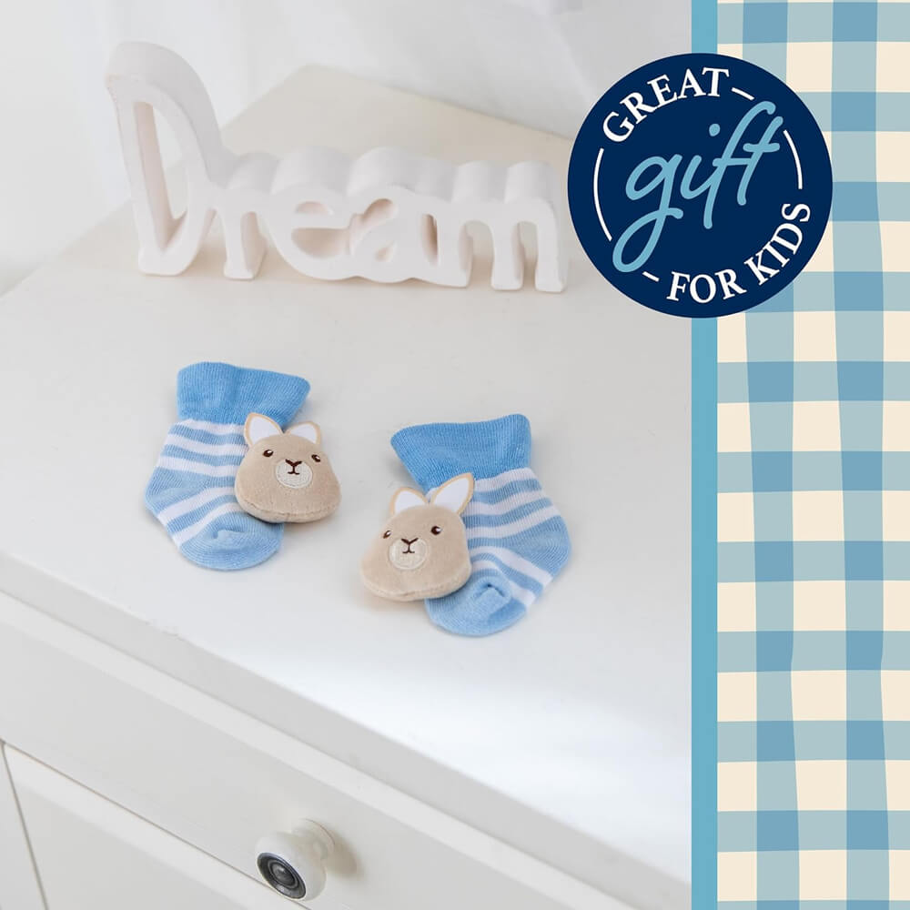 Peter Rabbit Ultra-Soft Baby Foot Rattles on a table background