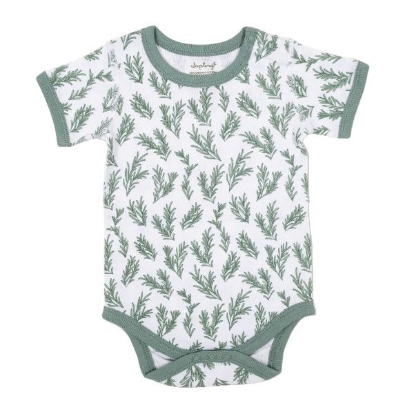 Baby onesie with green leaf pattern on a white background, featuring an organic cotton label.